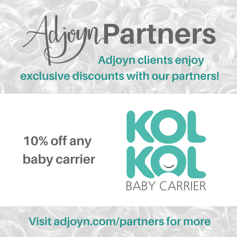 Adjoyn Partnership with Kol Kol Baby Carriers [Image is a graphic with text over a washed out image of a pile of rings. At the header is the Adjoyn logo and the word Partners, with text quote, Adjoyn clients enjoy exclusive discounts with our partners, end quote. At the footer of the image is text that reads quote, visit adjoyn dot com slash partners for more, end quote. The body of the image contains the Kol Kol baby carriers logo and texts the reads quote, 10 percent off any baby carrier.]